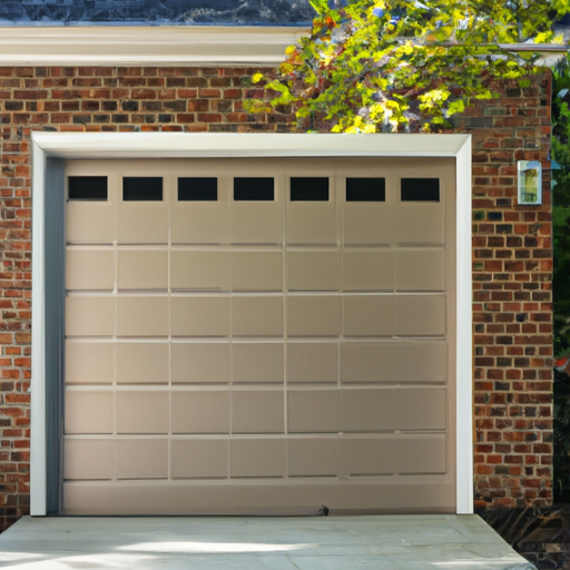 Insulated garage door on a Montclair, NJ home at dawn, closed, no people visible.